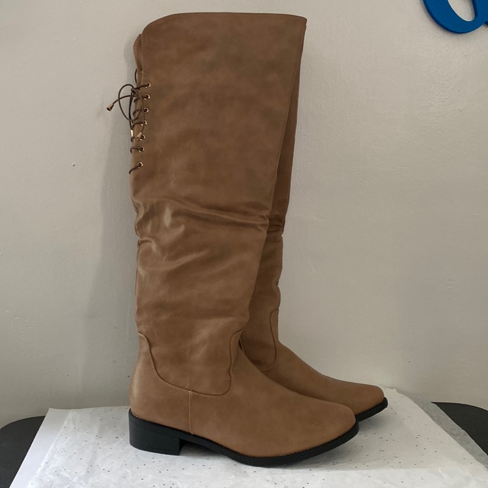 Tan size 10 over the knee boot.